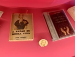 Artifacts Associated with Evita Perón: Small Photo of Evita Perón and a Copy of Her Book Titled "The Reason for My Life." and Evita House, Buenos Aires 1 by Wendy Howard