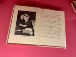 Artifacts Associated with Evita Perón: Translated Version of "The Reason for My Life" in Arabic, with Photo of the Author. Evita House, Buenos Aires by Wendy Howard