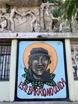Street Art Featuring Man Wearing Cap, Caminito Neighborhood, Buenos Aires 2 by Wendy Howard