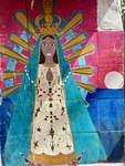 Bright mural of Virgin Mary at Santuario del Gauchito Gil in Argentina, showcasing local artistry and spiritual devotion by Wendy Howard