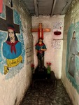 Visitors pay respects at the Santuario del Gauchito Gil in Parque Los Andes, Argentina, exploring traditions and culture of the region by Wendy Howard