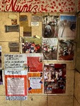 Collection of notices and photos on the wall at Santuario del Gauchito Gil in Parque Los Andes, Argentina showing activities and tributes by Wendy Howard