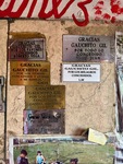 Visitors leave thanks and notes at Santuario del Gauchito Gil in Parque Los Andes, Argentina, showing gratitude and remembrance by Wendy Howard