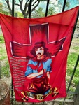 Flag dedicated to Gauchito Gil at Santuario del Gauchito Gil in Parque Los Andes, Argentina by Wendy Howard