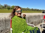 Lunch time at Laguna de los Coipos in Puerto Madero, Buenos Aires with a woman enjoying her time outdoors by Wendy Howard