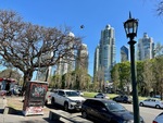 Lunchtime scene at Puerto Madero near Laguna de los Coipos in Buenos Aires showcasing city life and tall buildings by Wendy Howard