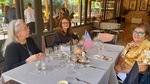 Lunch gathering at Lamadrid Estate Wines with guests enjoying conversation in Mendoza, Argentina by Wendy Howard