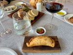 Enjoying traditional food at Lamadrid Estate Wines in Mendoza, Argentina during a culinary experience with wine by Wendy Howard