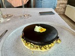 Dessert served at Lamadrid Estate Wines in Mendoza, Argentina features dark chocolate and pistachios with a floral garnish by Wendy Howard