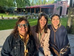 Friends enjoying time at Lamadrid Estate Wines in Mendoza, Argentina during a sunny afternoon by Wendy Howard