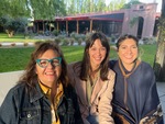 Group of friends enjoy their time at Lamadrid Estate Wines in Mendoza, Argentina during sunny afternoon by Wendy Howard