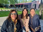 Visitors enjoying time at Lamadrid Estate Wines in Mendoza, Argentina with smiles during a sunny day by Wendy Howard