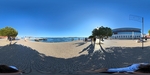 Walk along the waterfront in Lisbon with Cal√ßada Portuguesa patterns and sunlit views of the river by Wendy Howard