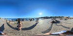 Walking along the waterfront in Lisbon, people enjoying the sun and the view of the river by Wendy Howard