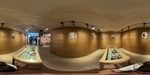 Art exhibition showcasing local artists in a Lisbon museum featuring various works and a vibrant cultural environment by Wendy Howard