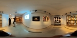 Art exhibition space showcasing diverse artworks in Lisbon gallery by Wendy Howard