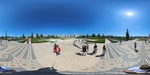 Visitors explore the gardens and paths of a famous park in Lisbon, surrounded by unique mosaic designs and beautiful architecture by Wendy Howard