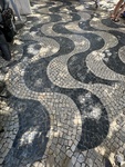 Wavy cobblestone pattern in a Lisbon street creating unique design and texture by Wendy Howard