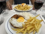 Tasty Portuguese meal with eggs, rice, and fries enjoyed in a Lisbon restaurant by Wendy Howard