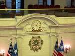 Historic Clock and Emblem in the Legislative Chamber of the Capitol in Puerto Rico by Maria Grisales
