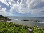 Serene Coastal View from the Captiol Building in San Juan by Eric Fabra