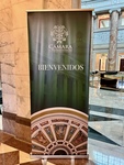 Cámara de Representantes de Puerto Rico Welcomes Visitors With a Decorative Banner in an Elegant Lobby Setting by Wendy Howard