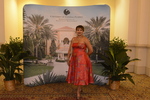 Susan Vernon-Devlin at step and repeat by Rosen College of Hospitality Management