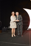 Kathie Canning receives award from Dr. Pizam 3 by Rosen College of Hospitality Management