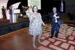 Kathie Canning and Gary Glassman dancing by Rosen College of Hospitality Management