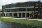 Classroom Building I entrance - view from pond