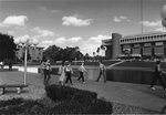 Library - students walking in front of Millican Hall