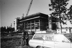 Library construction - station wagon and kids