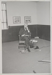 Millican, Charles N. - in an empty downtown office