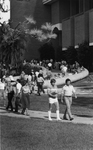 Library - students walking as seen from Math & Physics Building, September 1980 by Jon Findell